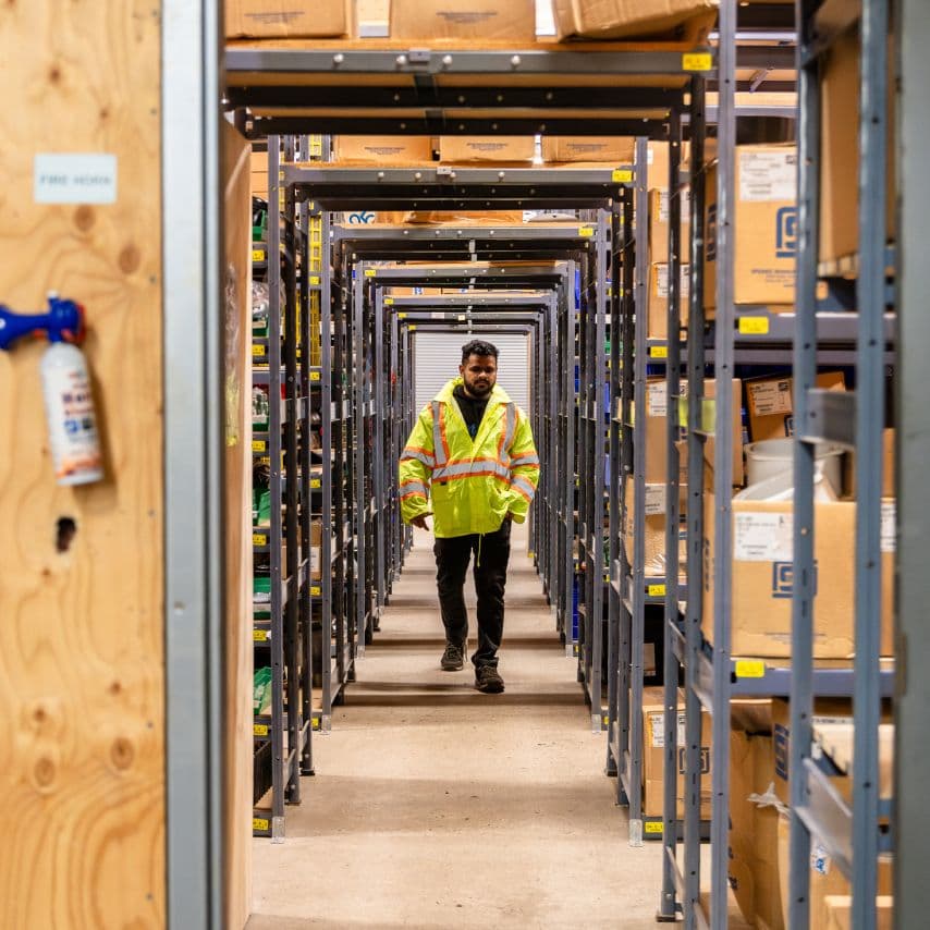 man walking down hall