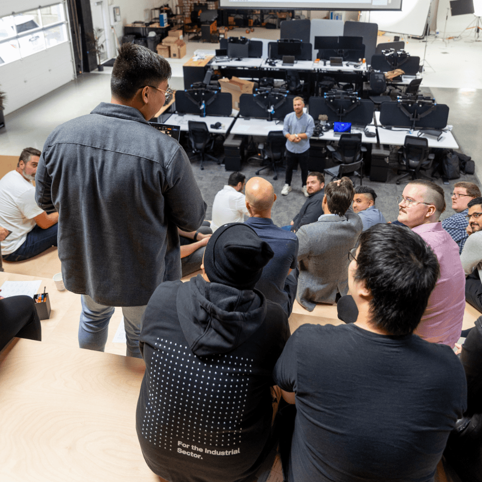 Group of people on risers in office